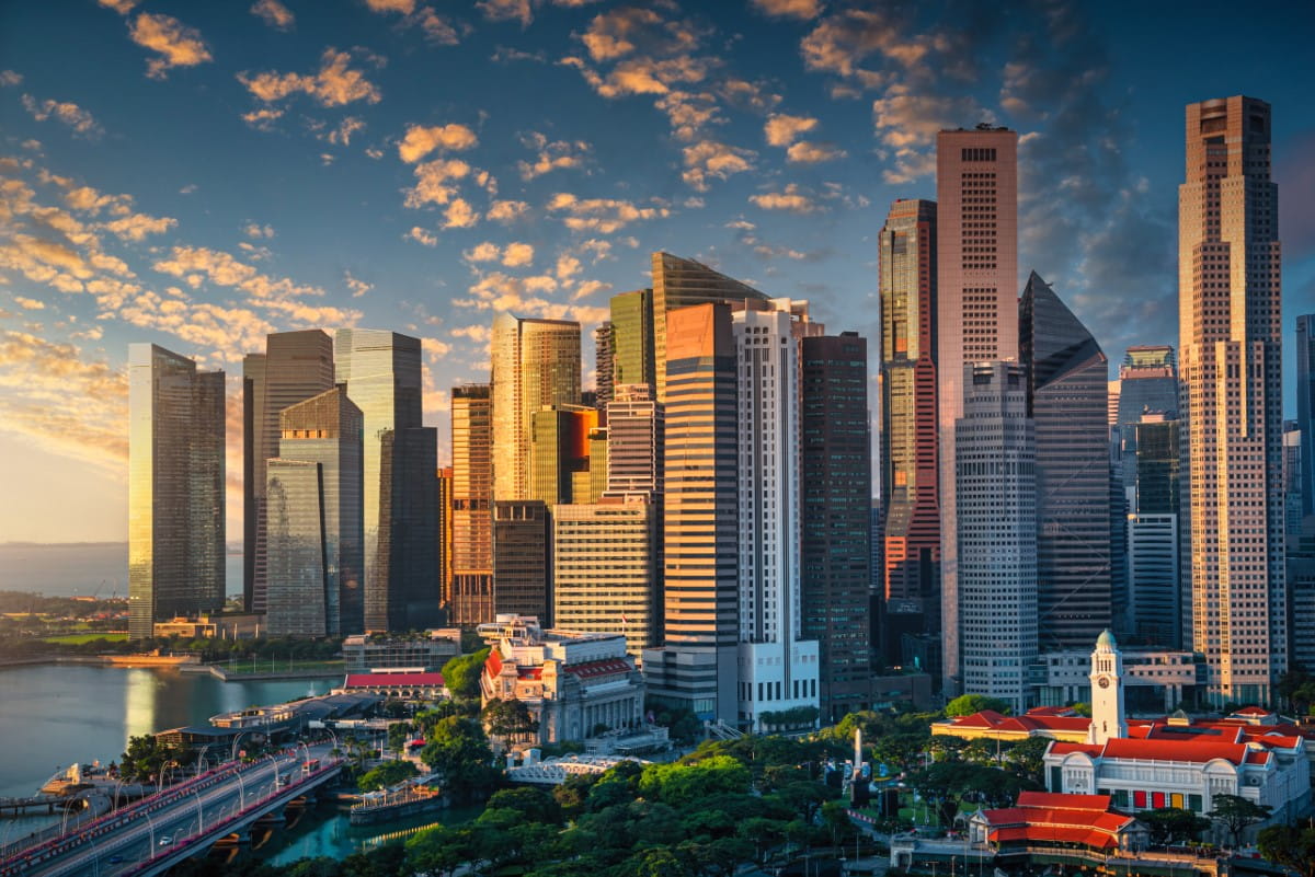 singapore skyline with dramatic sky sunrise Custom min 768x513