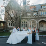 Kitty with her bridesmaids in front of the church